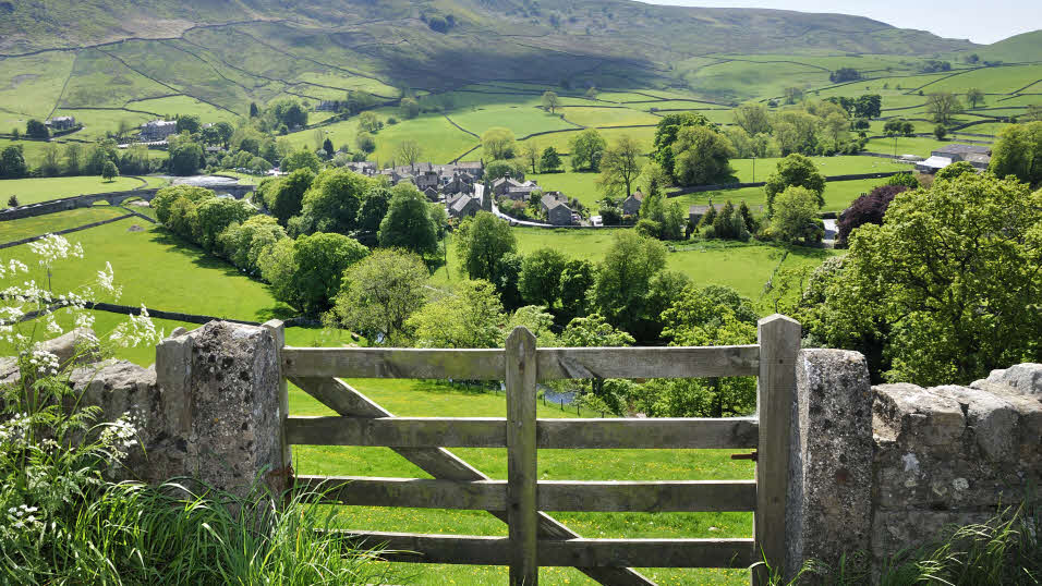 wooden gate and stone wall in Yorkshire Dales National Park